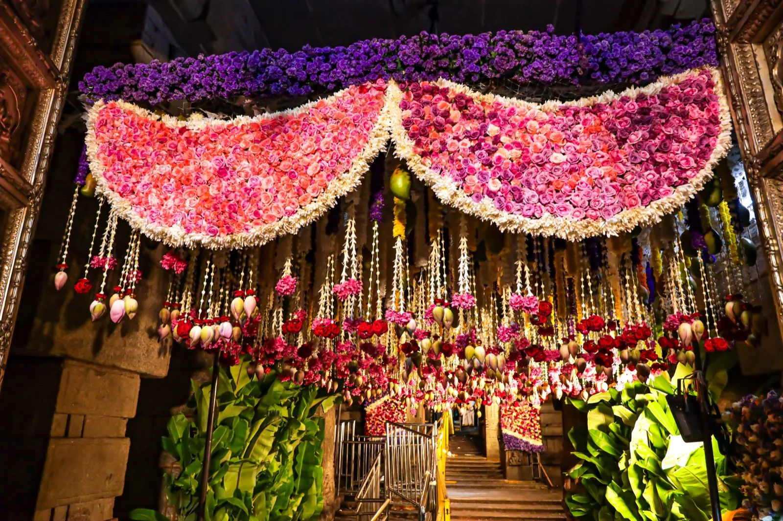 Abundant floral offerings adorning the temple interior